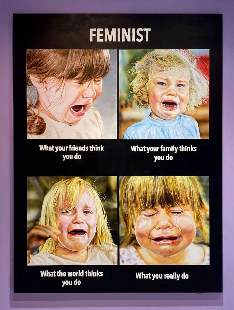 four paintings of feminist memes of crying little girls with captions by artist Christine Wang